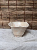Hagi Ware Trumpet Cup — Wave-Rim Form, Ivory Glaze with Iron Blush