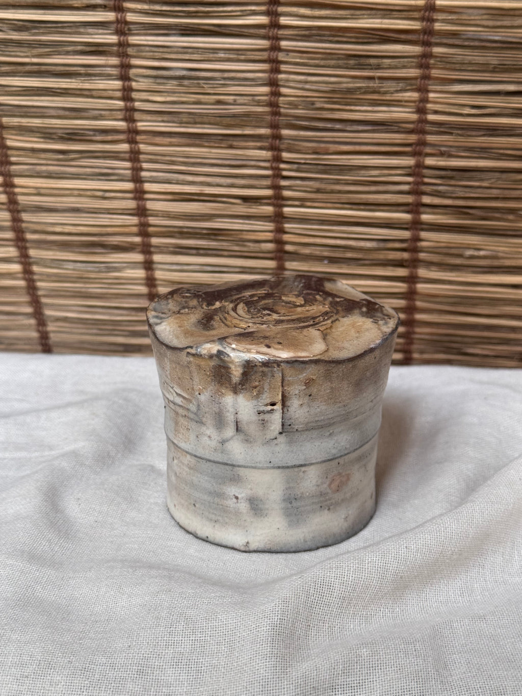 Hagi-Ware Ash-Glazed Stoneware Cup — Tapered Form, Oval Cross-Section, Smoky Fire Markings