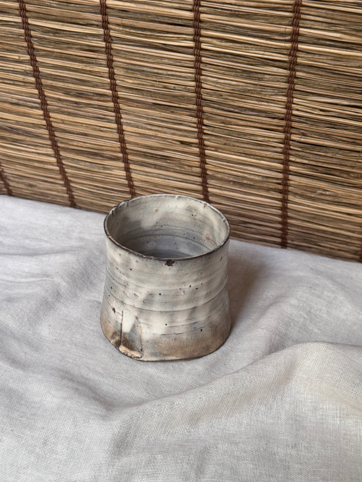 Hagi-Ware Ash-Glazed Stoneware Cup — Tapered Form, Oval Cross-Section, Smoky Fire Markings