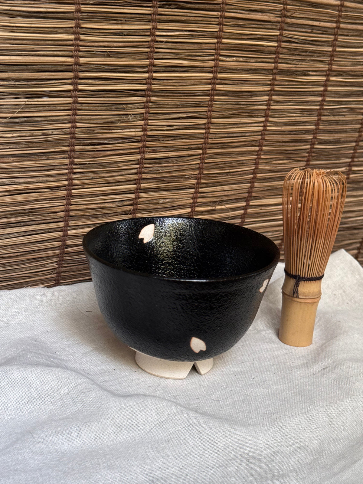 Seto-yaki by Yoshiki Sugiura Matcha Chawan — Black Glaze with Cut-Out Cherry Blossom Petals, Split Foot, Signed & Boxed