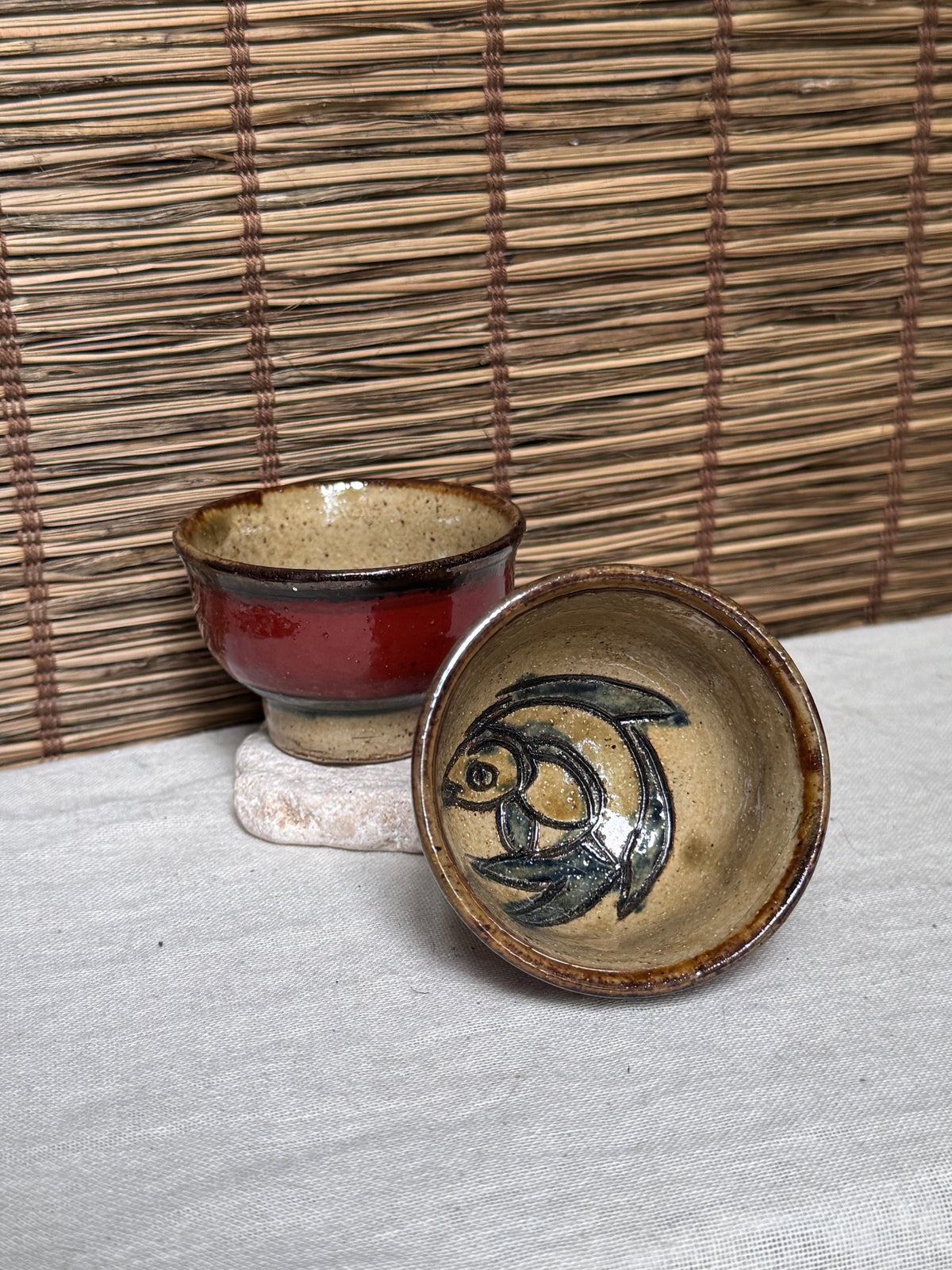 Tsuboya Ware by Arakaki Isao Tea Cup Pair — Iron-Painted Fish Motif
