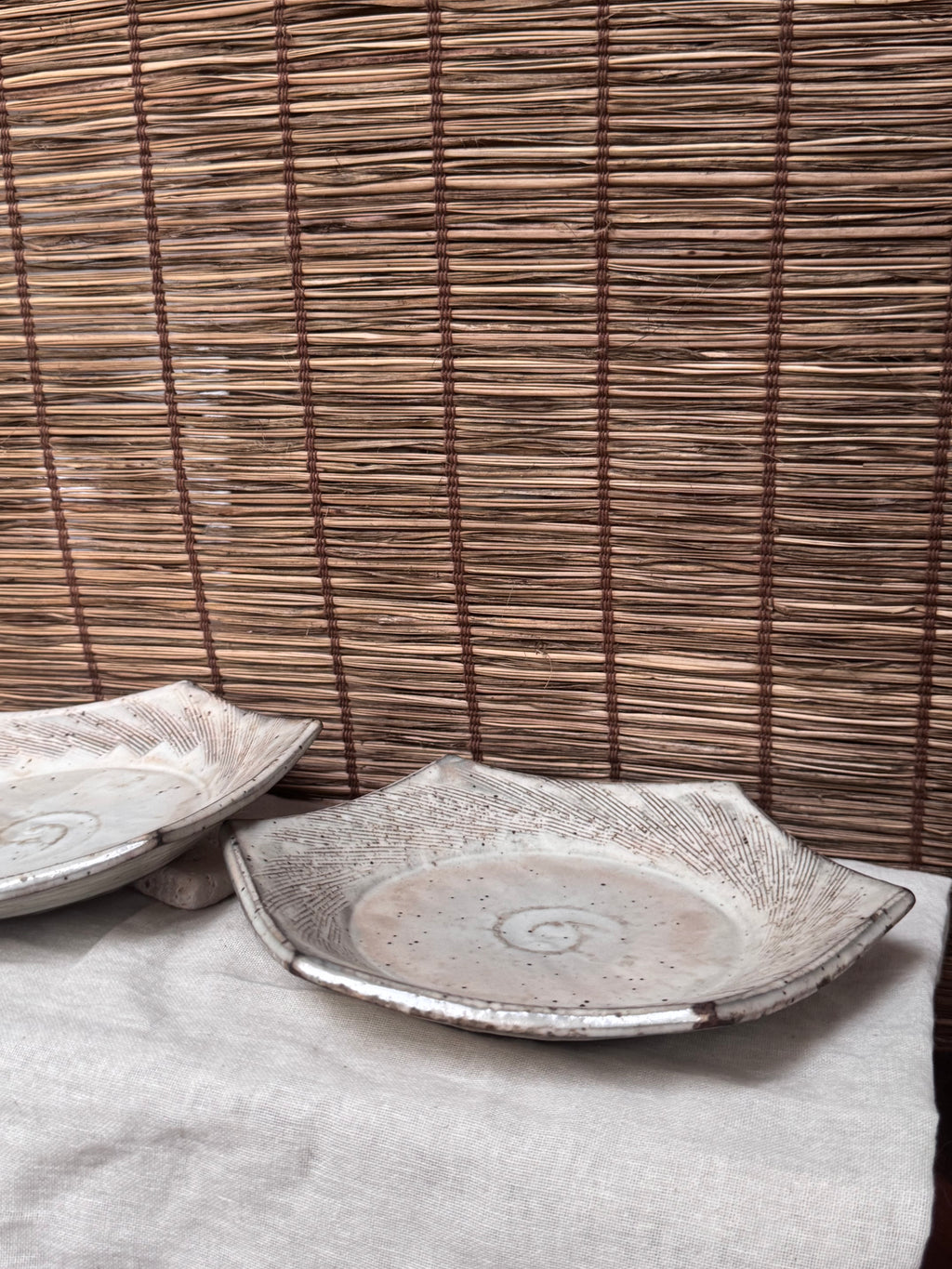 Hexagonal Studio Clip Sunburst Dishes, Pair — Combed Radiating Lines, Spiral Center, Speckled White Glaze