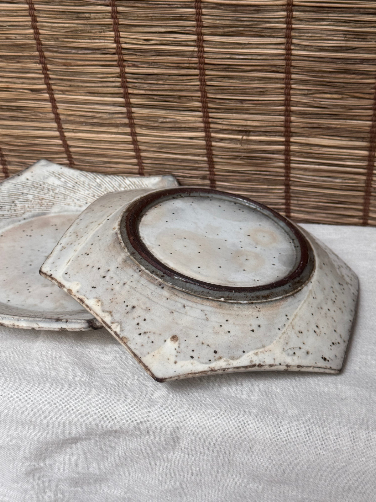 Hexagonal Studio Clip Sunburst Dishes, Pair — Combed Radiating Lines, Spiral Center, Speckled White Glaze