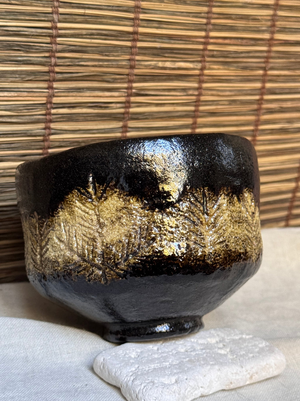 Shōraku Kiln Kuro-Raku Chawan — Incised Pine Forest Band, with Wooden Box