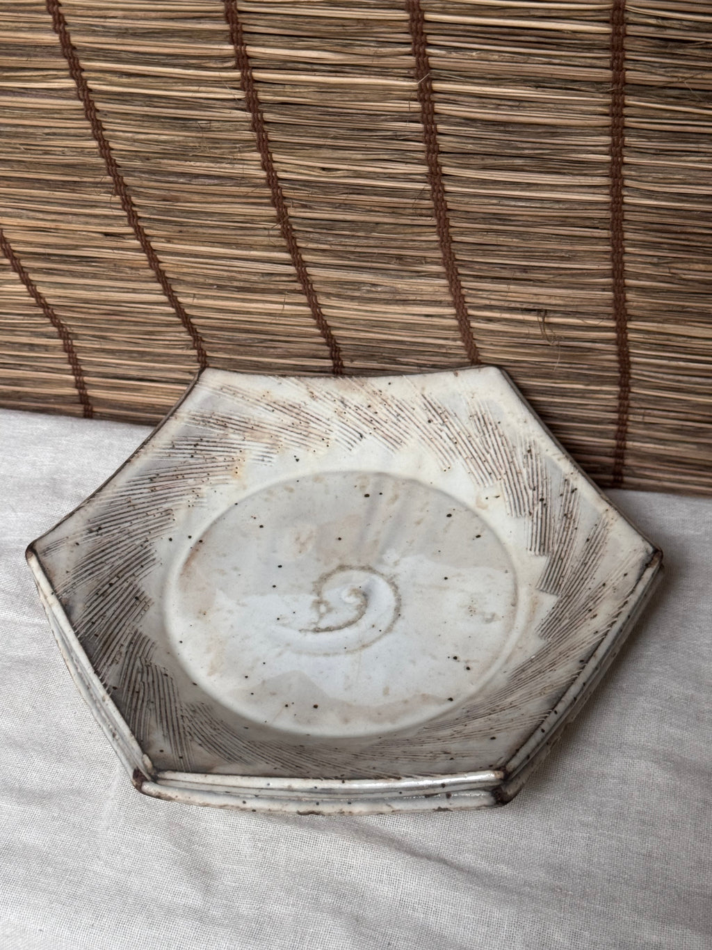Hexagonal Studio Clip Sunburst Dishes, Pair — Combed Radiating Lines, Spiral Center, Speckled White Glaze