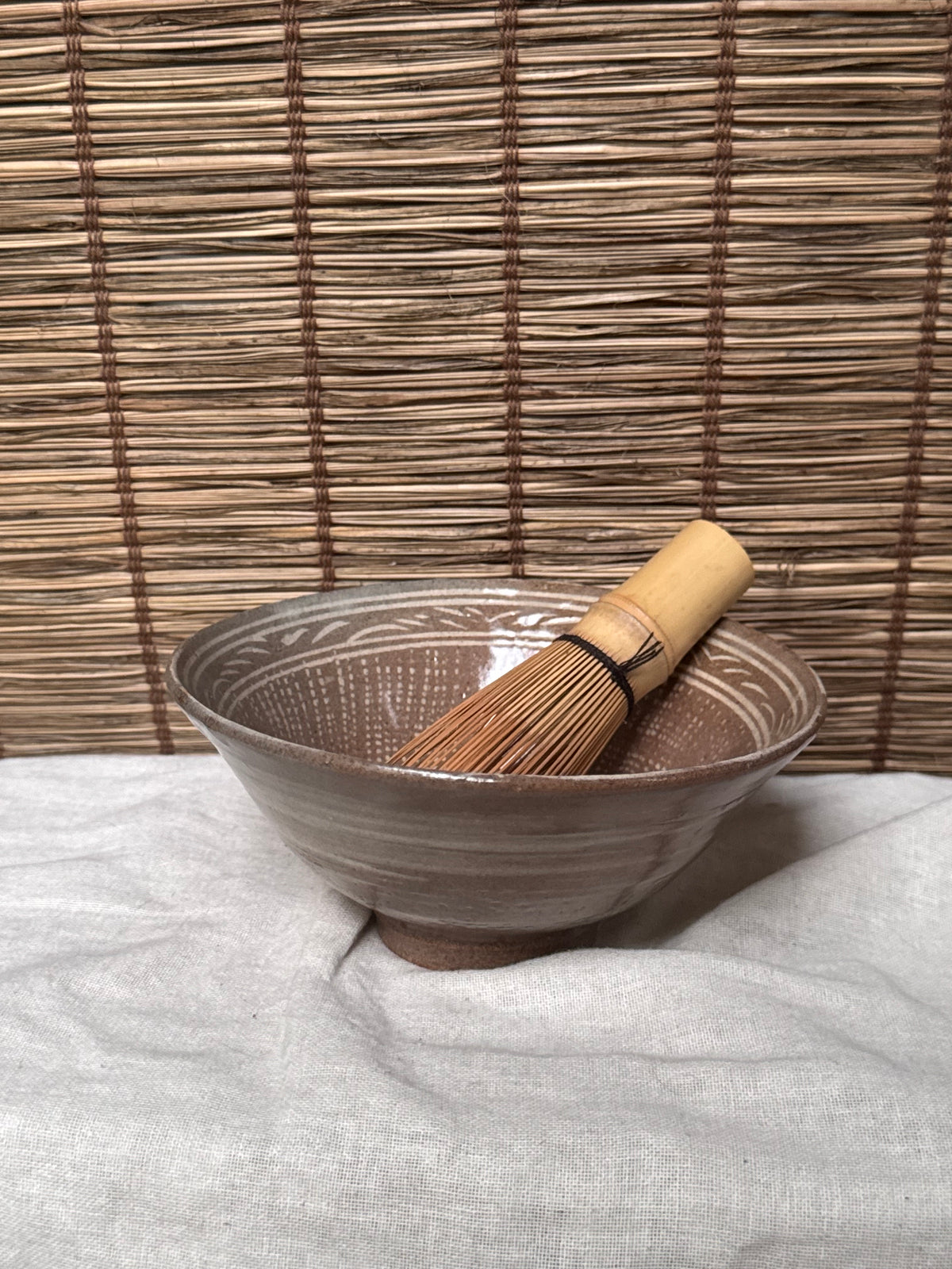Mishima Matcha Chawan — Inlaid White Slip, Stamped Chrysanthemums, Brushed Slip Exterior