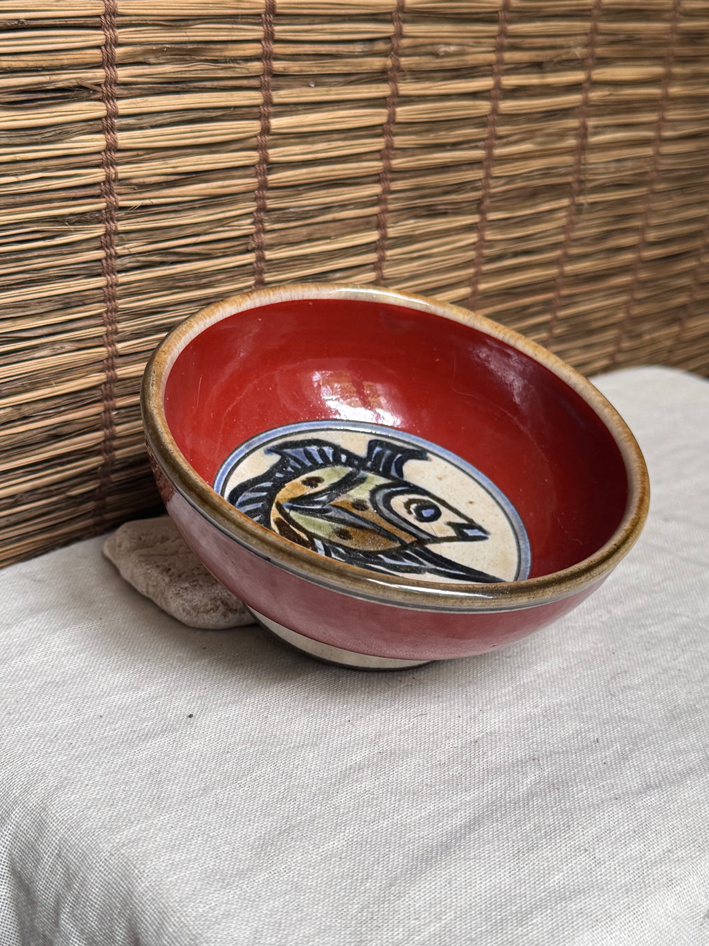 Tsuboya Ware by Toshiyuki Kinjo Rice Bowl — Copper-Red Glaze, Medallion Fish Motif