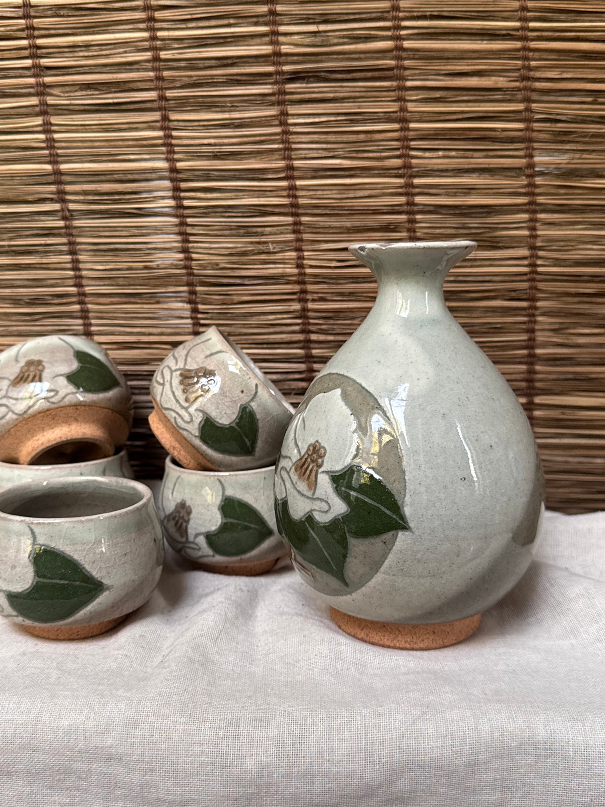 Mino Yaki Celadon Sake Set with Hand-Painted Camellia, Bottle & 6 Cups