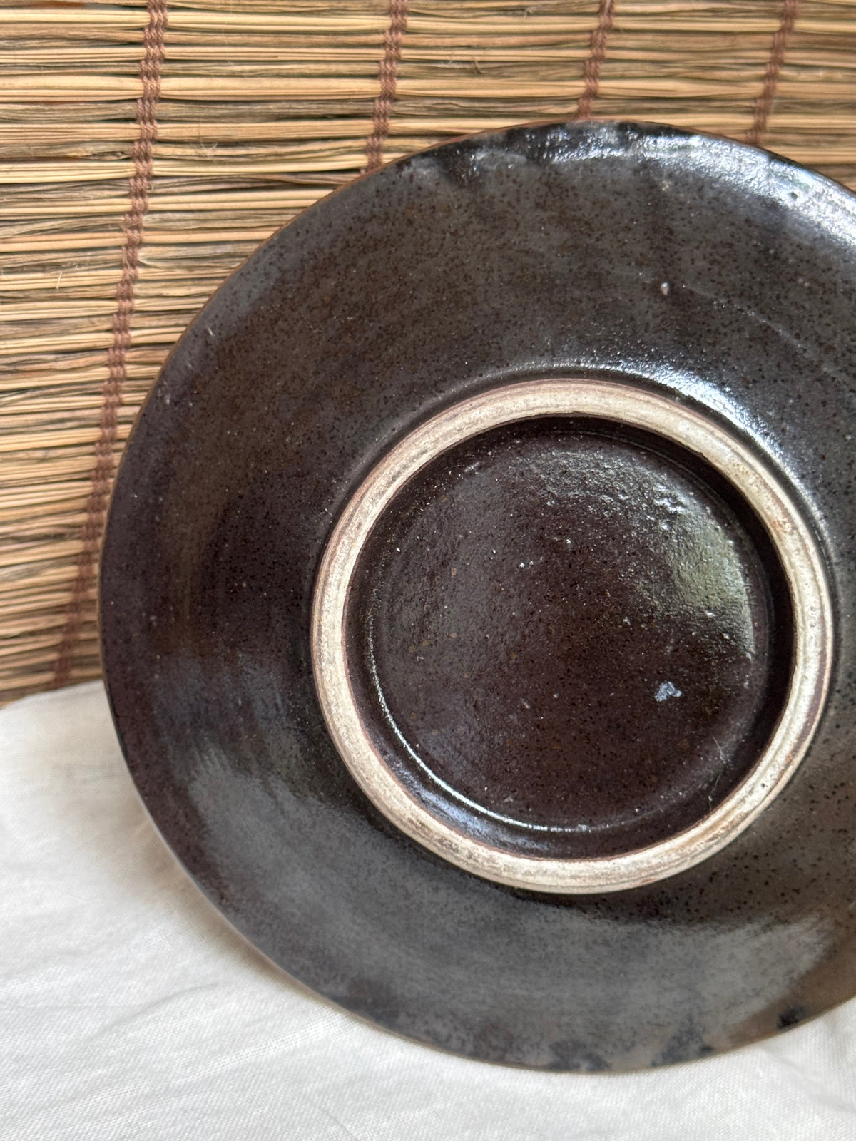 Yachimun Plate by Ken Sugawara - Hand-Painted Tenmoku Glaze, Cream Floral & Scroll Motif