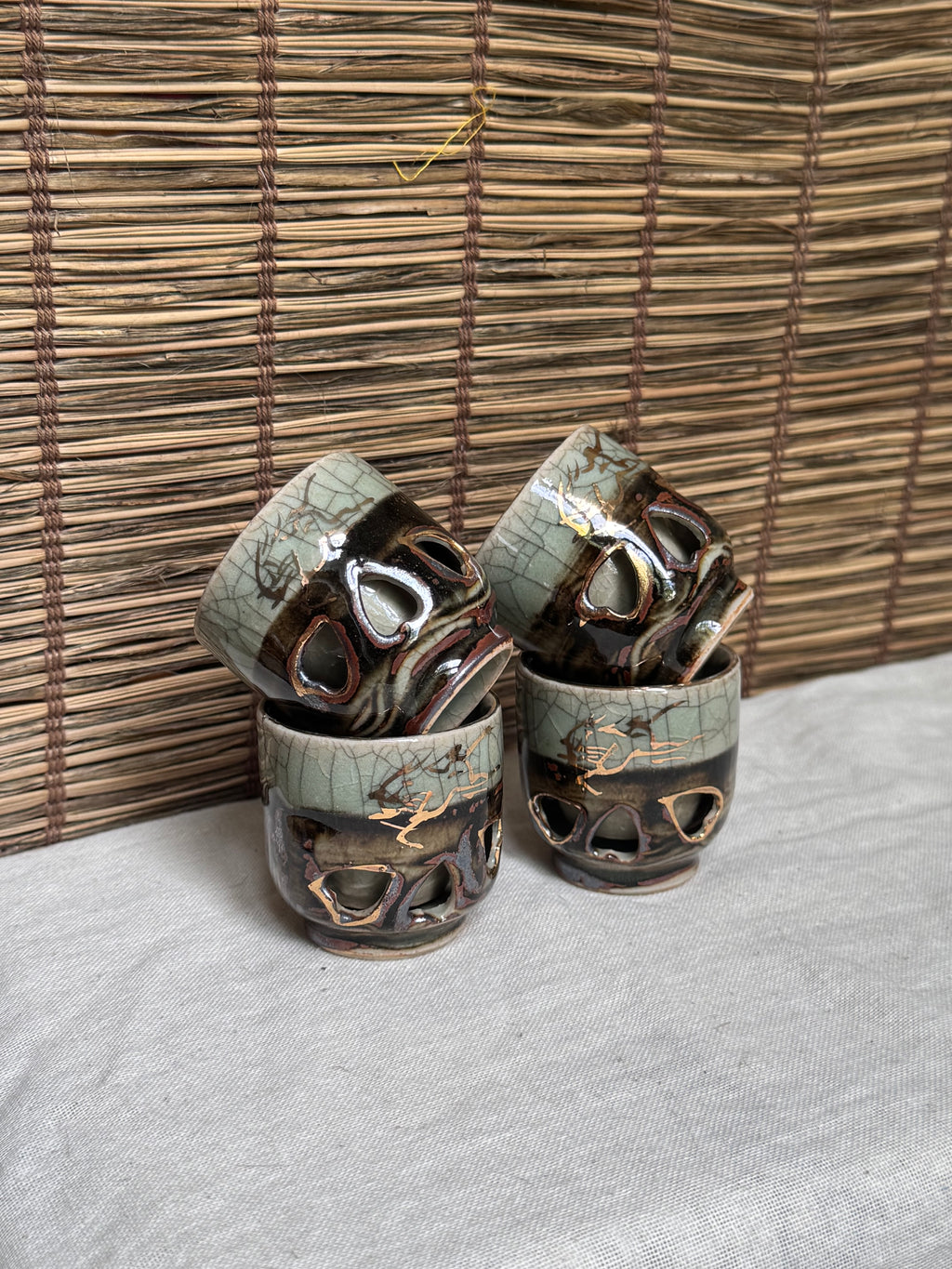 Sōma-yaki Double-Walled Cups, Set of 4 — Crackle Celadon Glaze, Cutout Design, Horse Gold Accents