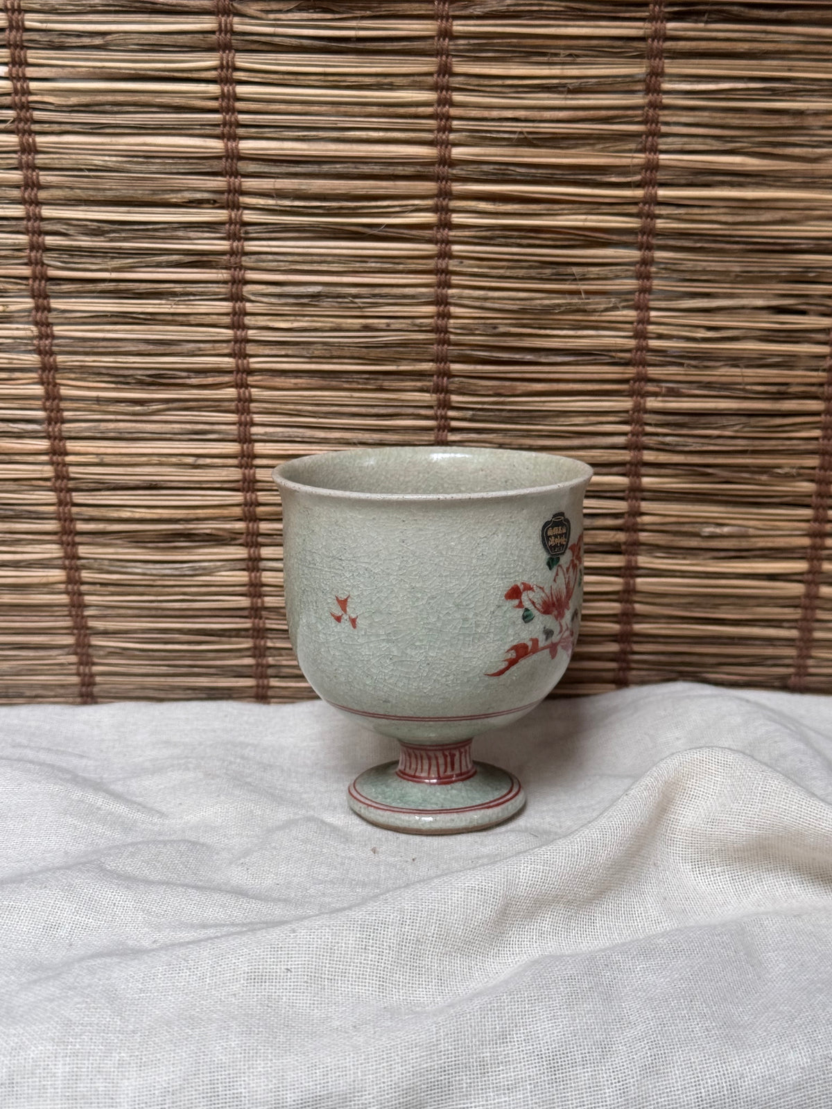 Footed Celadon Cup — Iron-Red Floral Spray, Crackle Glaze