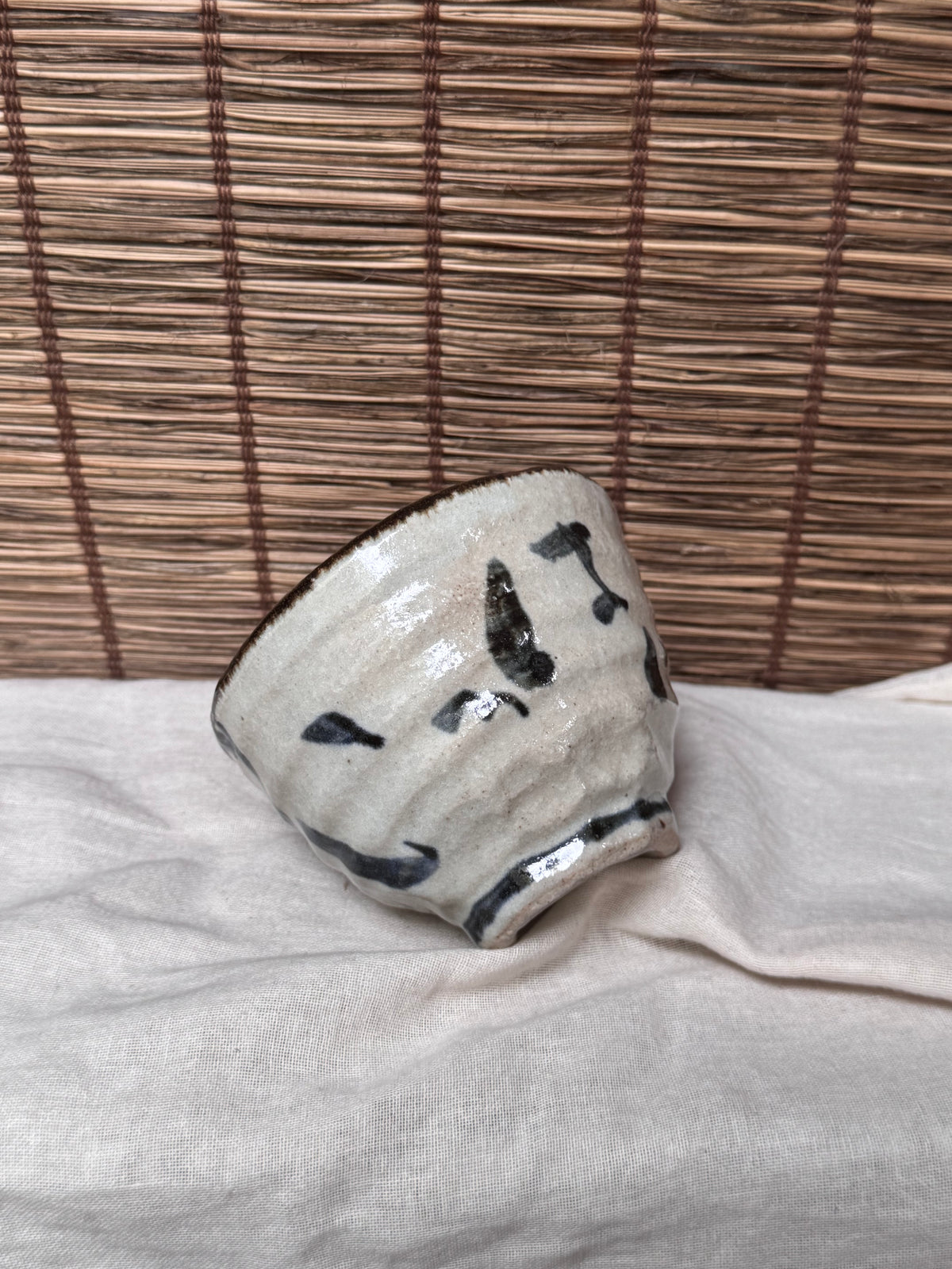 Mino-Karatsu Teacup — Painted Foliage Motif, Iron-Brown Dripped Rim