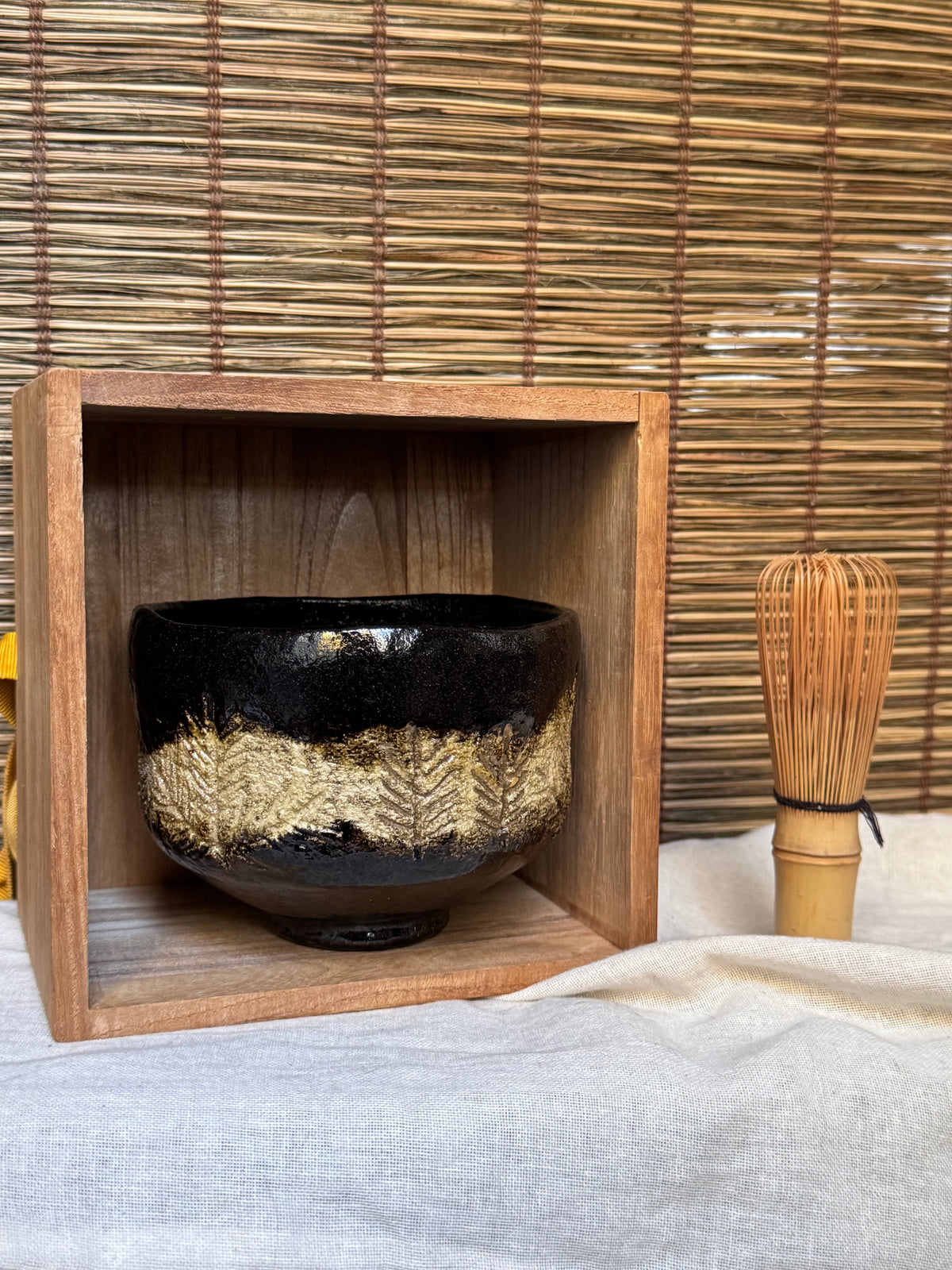 Shōraku Kiln Kuro-Raku Chawan — Incised Pine Forest Band, with Wooden Box