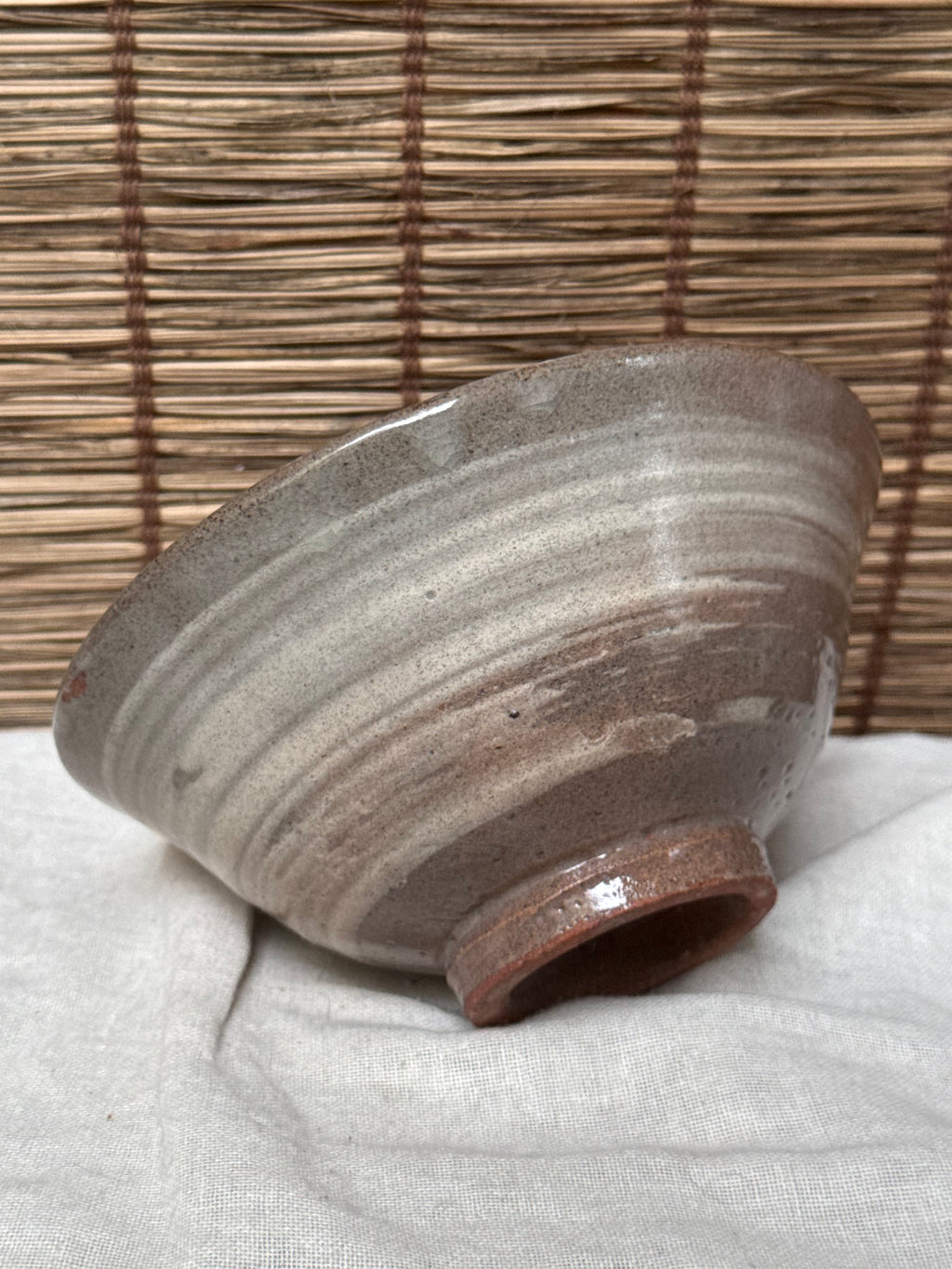 Mishima Matcha Chawan — Inlaid White Slip, Stamped Chrysanthemums, Brushed Slip Exterior
