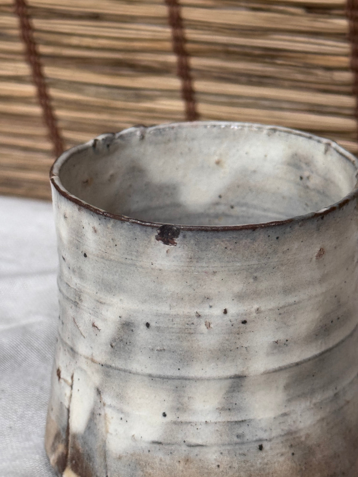 Hagi-Ware Ash-Glazed Stoneware Cup — Tapered Form, Oval Cross-Section, Smoky Fire Markings