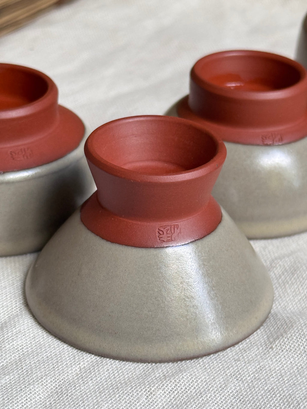 Mumyoi Ware Yunomi Tea Cup Set — Sado Island Red Clay, Hand-Painted Fish Motif, Set of 4