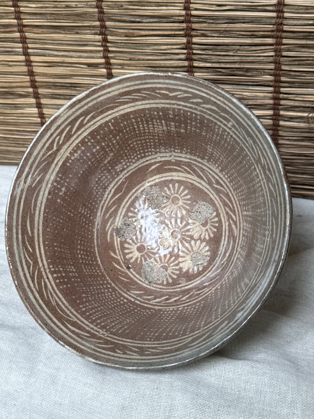 Mishima Matcha Chawan — Inlaid White Slip, Stamped Chrysanthemums, Brushed Slip Exterior