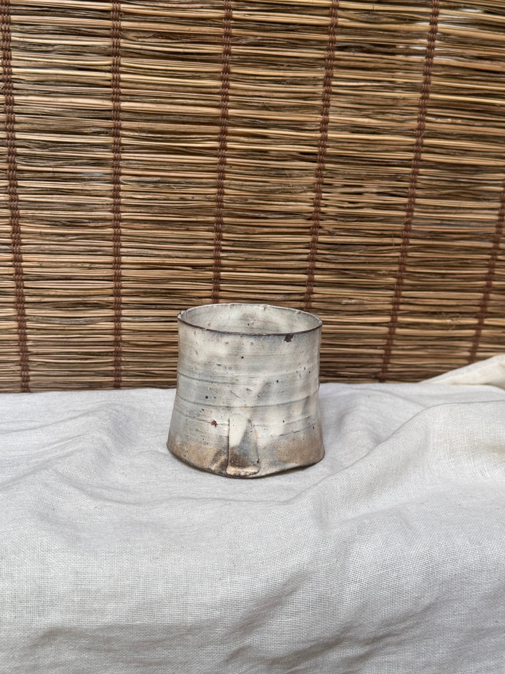 Hagi-Ware Ash-Glazed Stoneware Cup — Tapered Form, Oval Cross-Section, Smoky Fire Markings