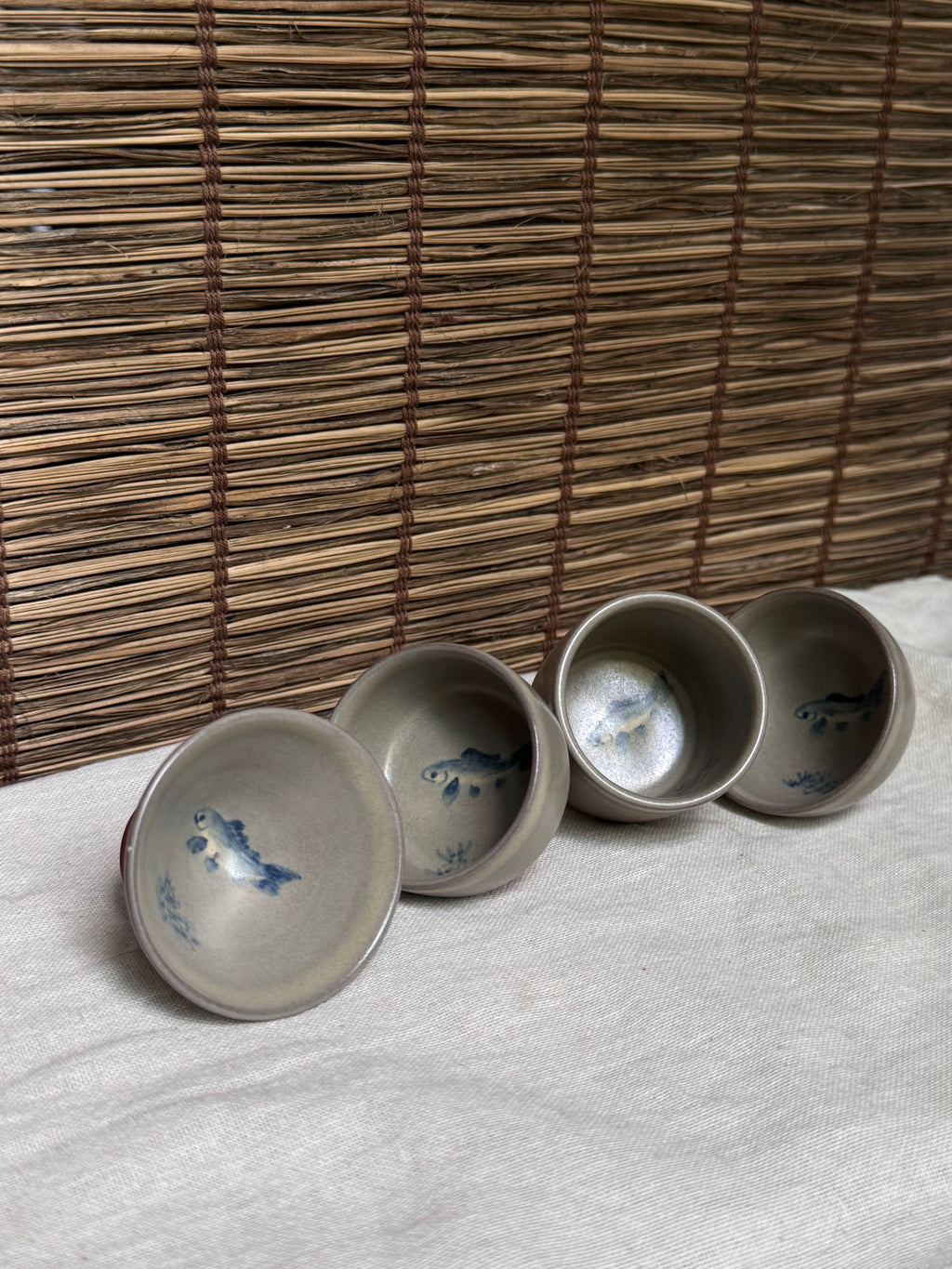 Mumyoi Ware Yunomi Tea Cup Set — Sado Island Red Clay, Hand-Painted Fish Motif, Set of 4