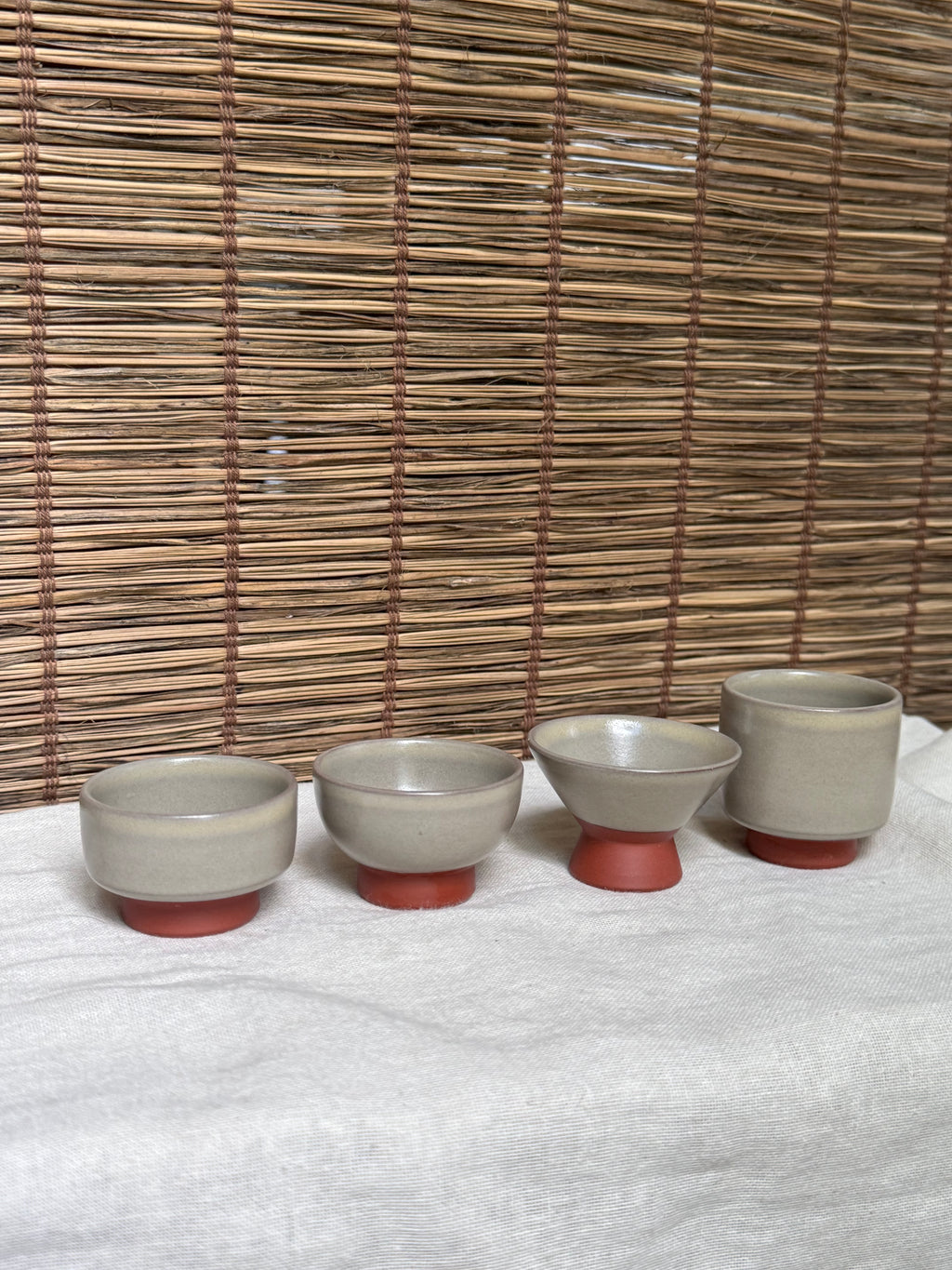 Mumyoi Ware Yunomi Tea Cup Set — Sado Island Red Clay, Hand-Painted Fish Motif, Set of 4