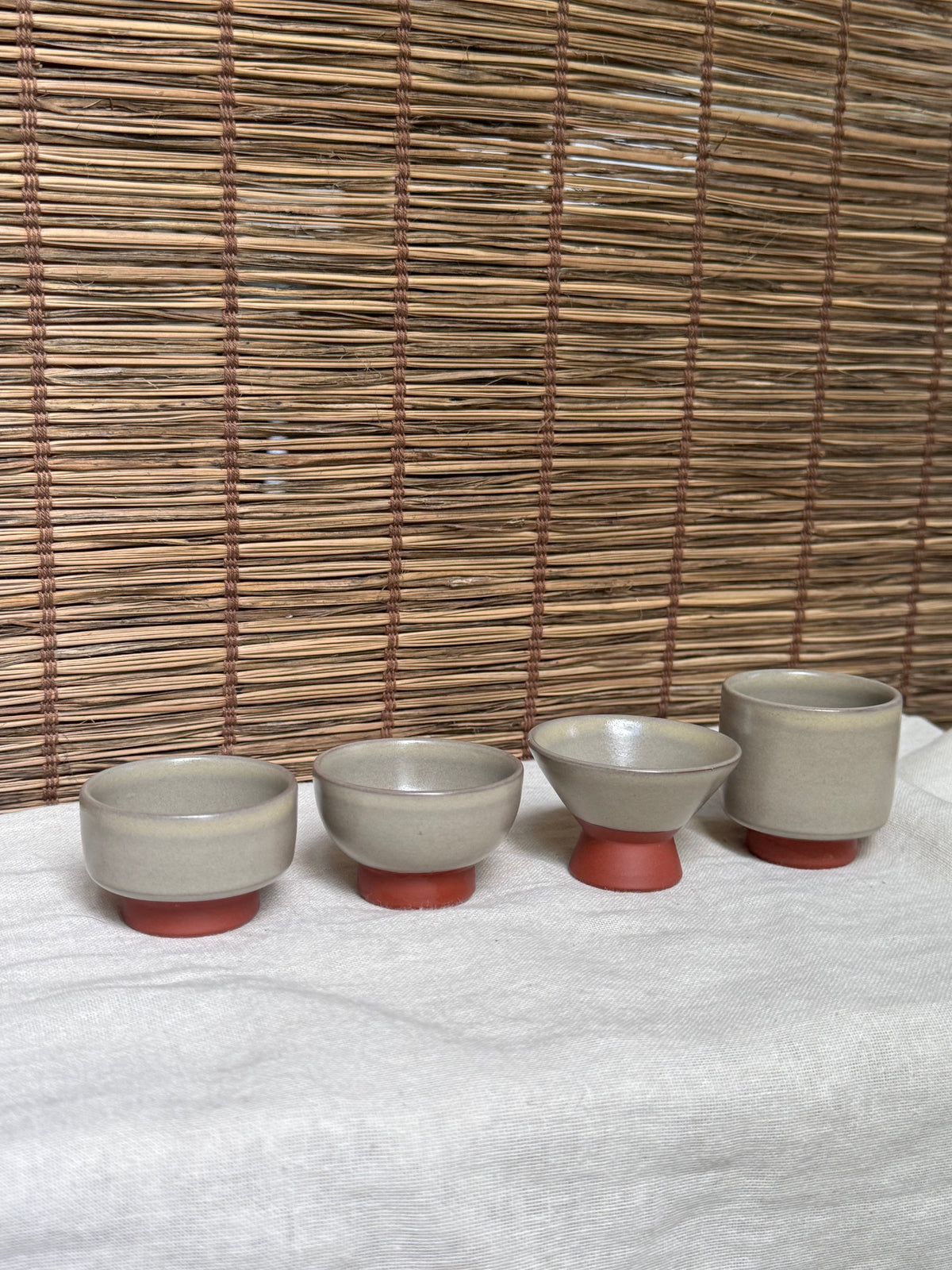 Mumyoi Ware Yunomi Tea Cup Set — Sado Island Red Clay, Hand-Painted Fish Motif, Set of 4