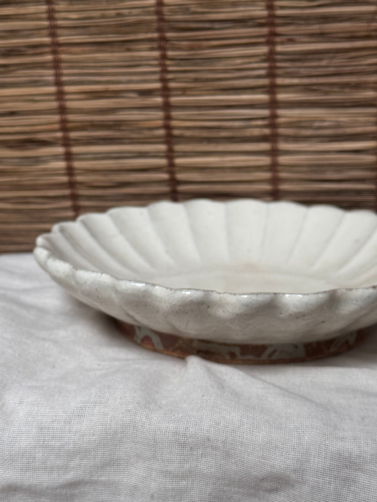Fluted Chrysanthemum Dish — White Monochrome Glaze, Ribbed Petal Rim, Raised Glazed Footring