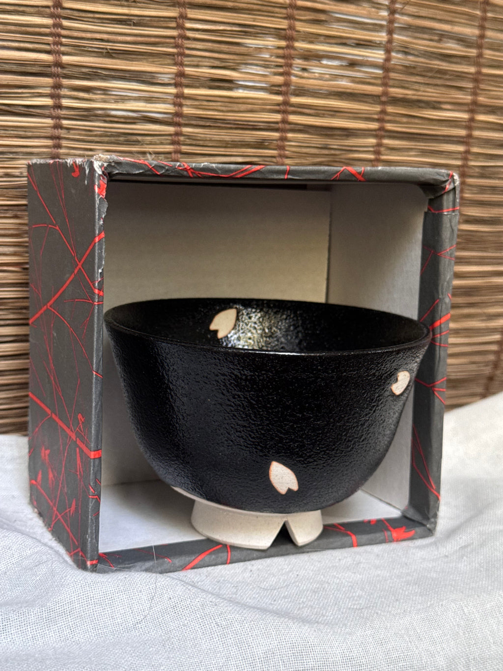 Seto-yaki by Yoshiki Sugiura Matcha Chawan — Black Glaze with Cut-Out Cherry Blossom Petals, Split Foot, Signed & Boxed
