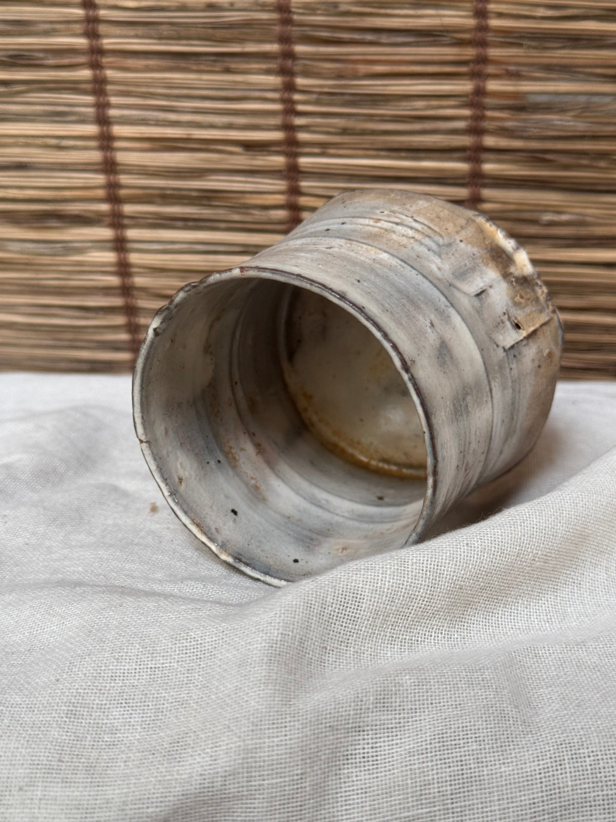 Hagi-Ware Ash-Glazed Stoneware Cup — Tapered Form, Oval Cross-Section, Smoky Fire Markings