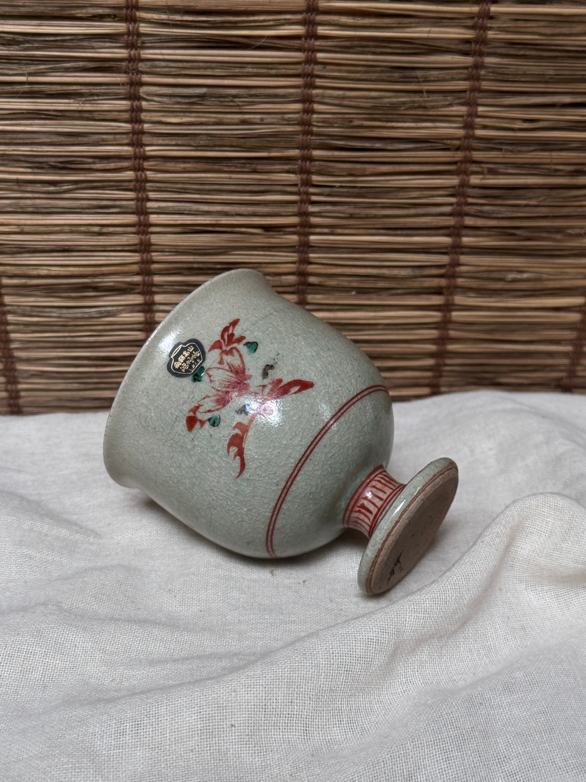 Footed Celadon Cup — Iron-Red Floral Spray, Crackle Glaze