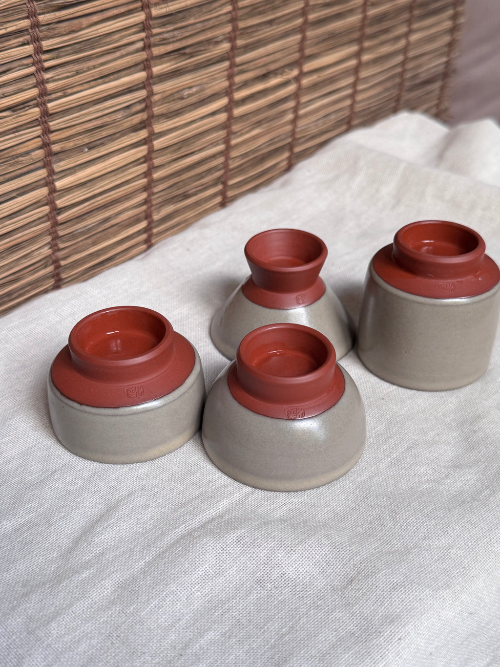 Mumyoi Ware Yunomi Tea Cup Set — Sado Island Red Clay, Hand-Painted Fish Motif, Set of 4