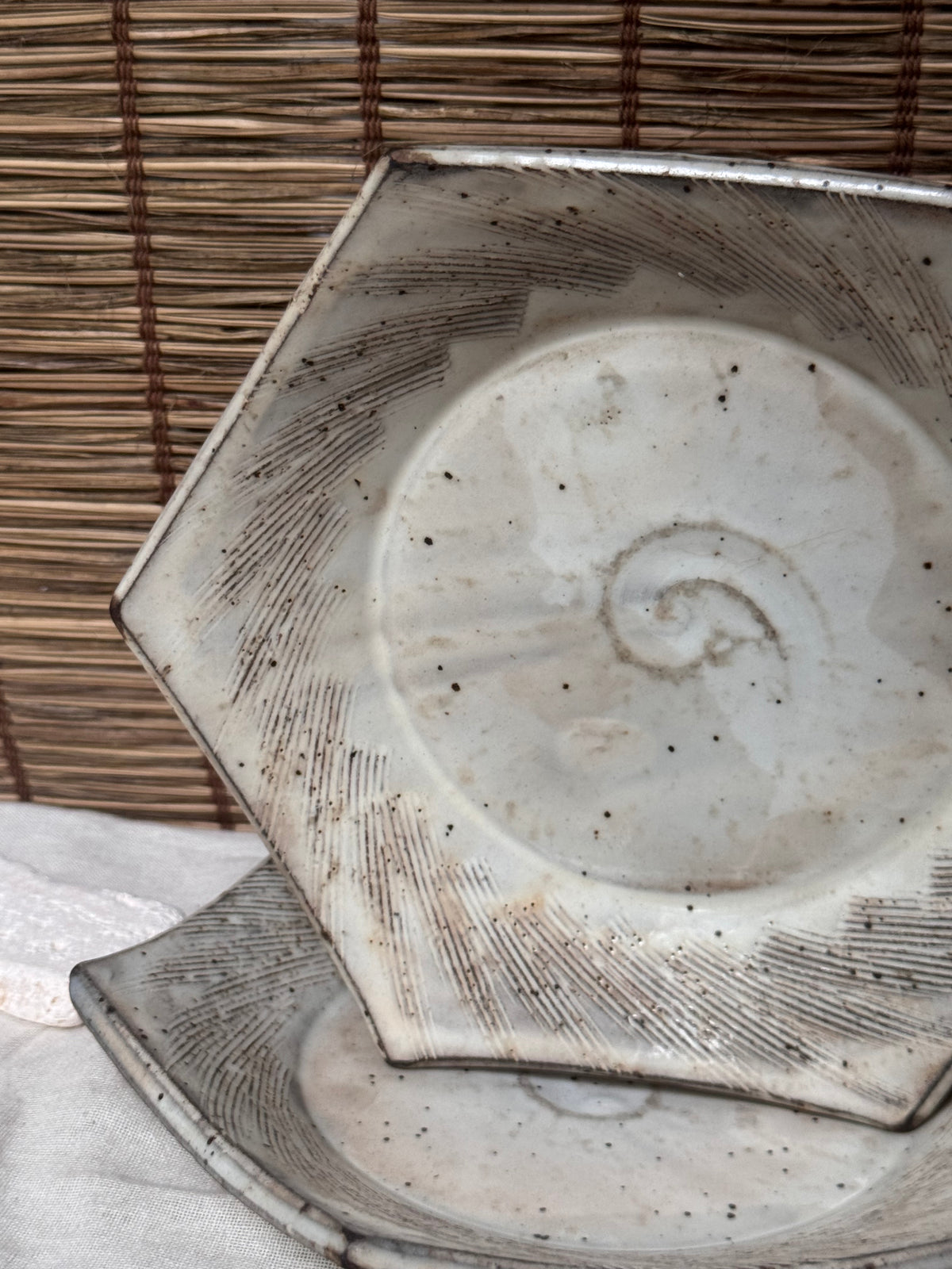 Hexagonal Studio Clip Sunburst Dishes, Pair — Combed Radiating Lines, Spiral Center, Speckled White Glaze