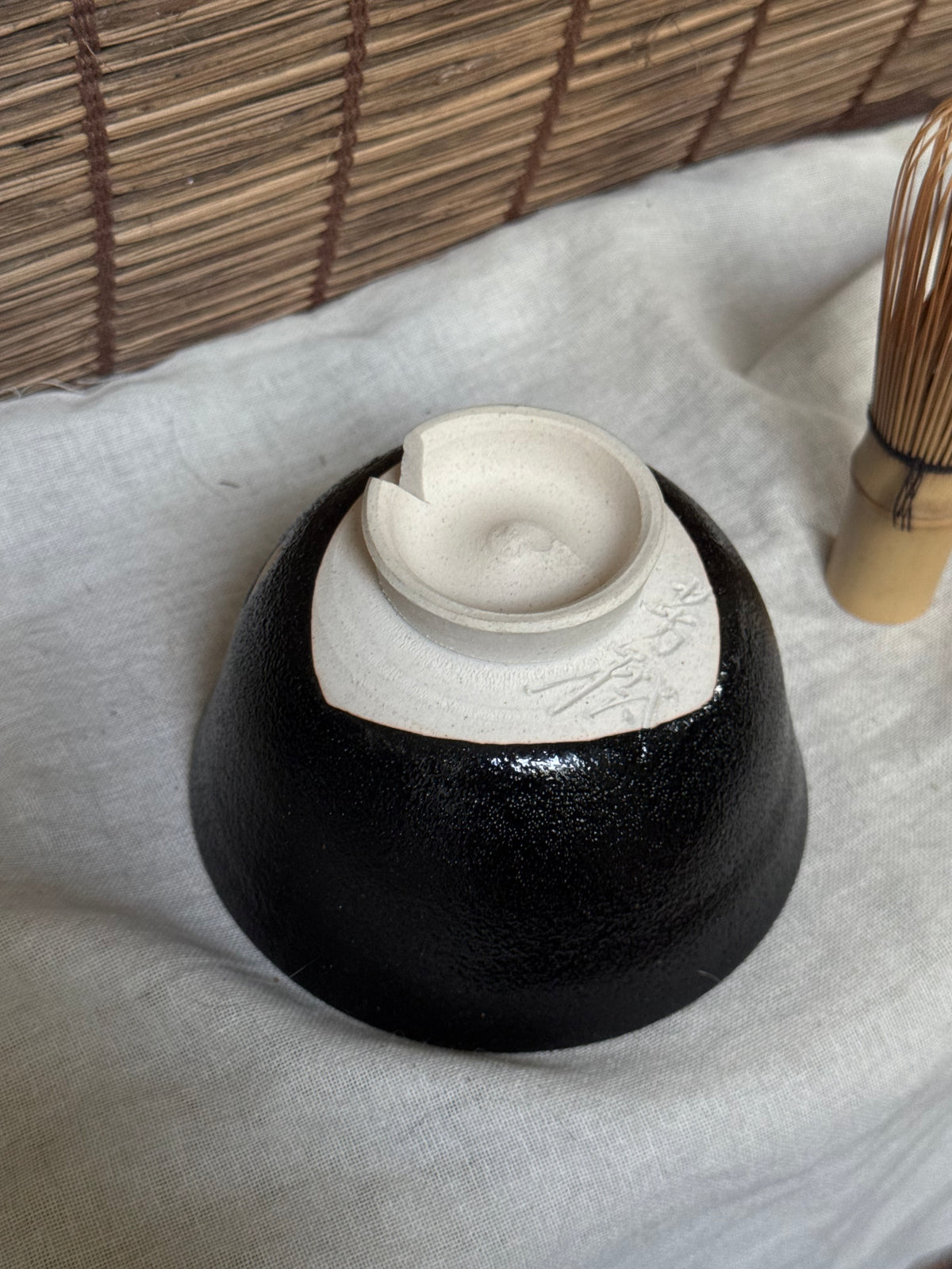 Seto-yaki by Yoshiki Sugiura Matcha Chawan — Black Glaze with Cut-Out Cherry Blossom Petals, Split Foot, Signed & Boxed