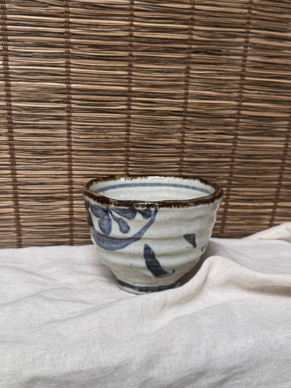 Mino-Karatsu Teacup — Painted Foliage Motif, Iron-Brown Dripped Rim