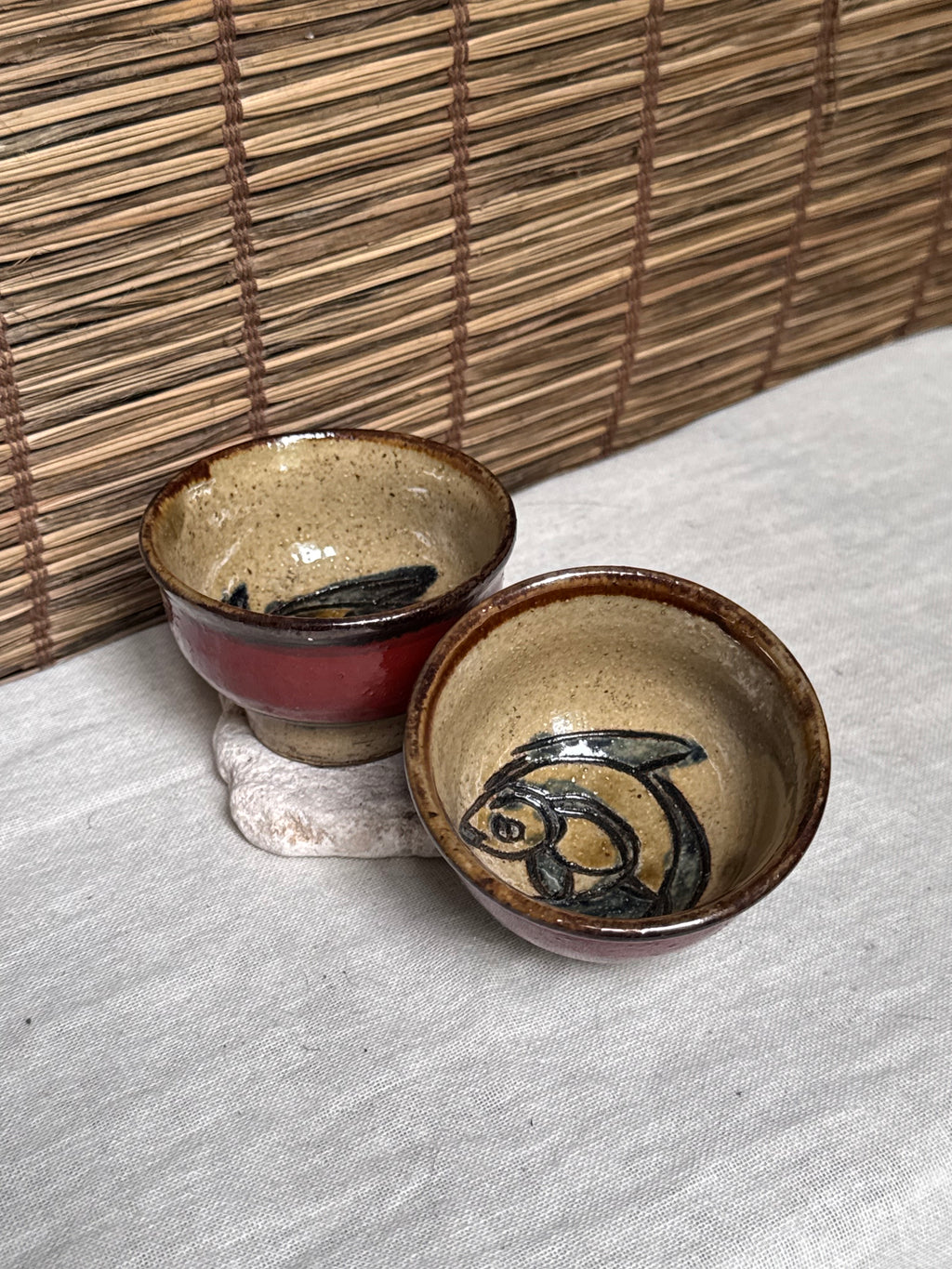 Tsuboya Ware by Arakaki Isao Tea Cup Pair — Iron-Painted Fish Motif