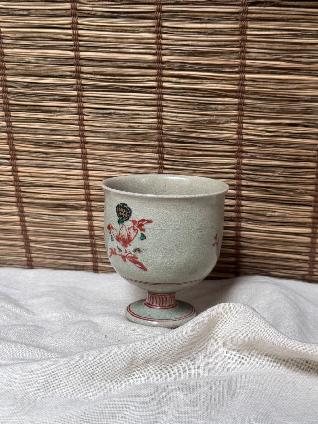 Footed Celadon Cup — Iron-Red Floral Spray, Crackle Glaze