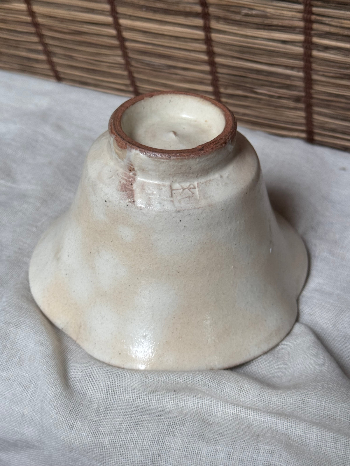 Hagi Ware Trumpet Cup — Wave-Rim Form, Ivory Glaze with Iron Blush