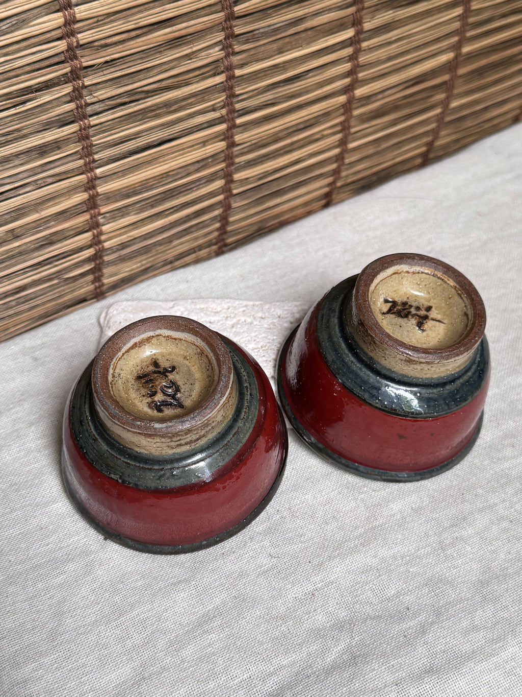 Tsuboya Ware by Arakaki Isao Tea Cup Pair — Iron-Painted Fish Motif