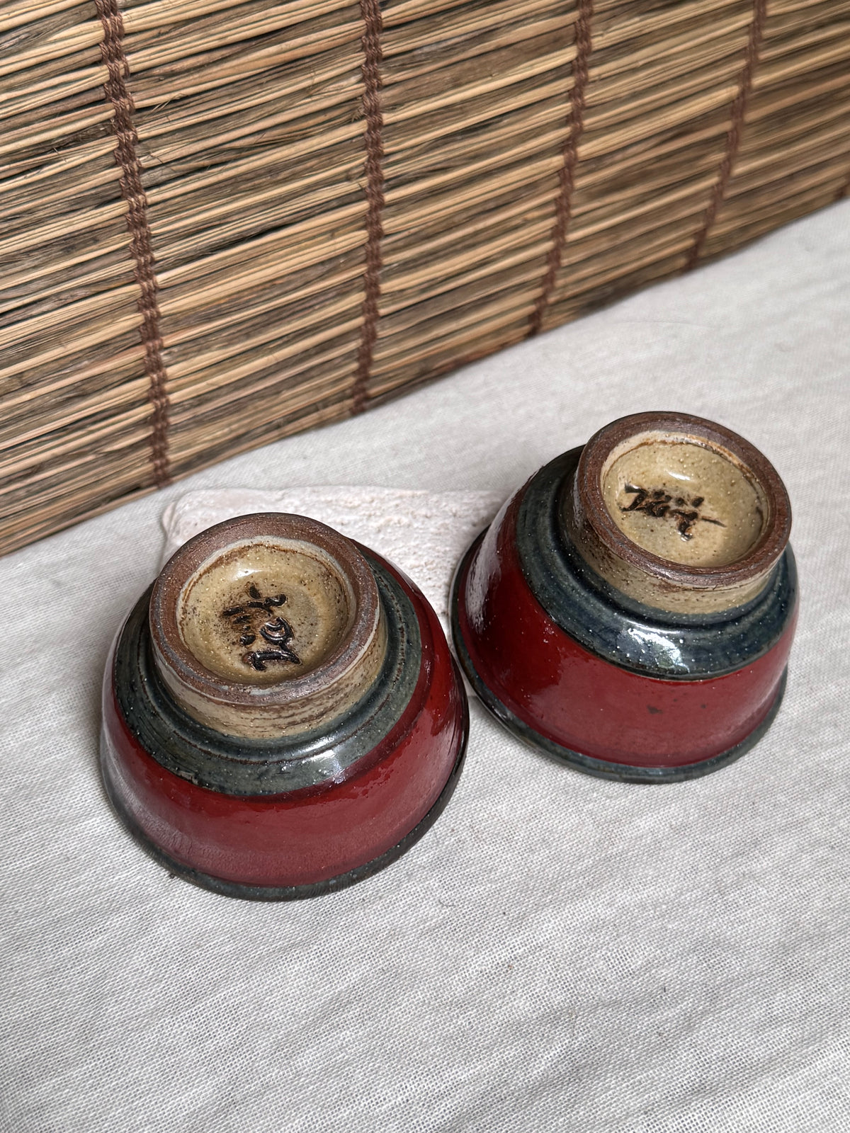 Tsuboya Ware by Arakaki Isao Tea Cup Pair — Iron-Painted Fish Motif