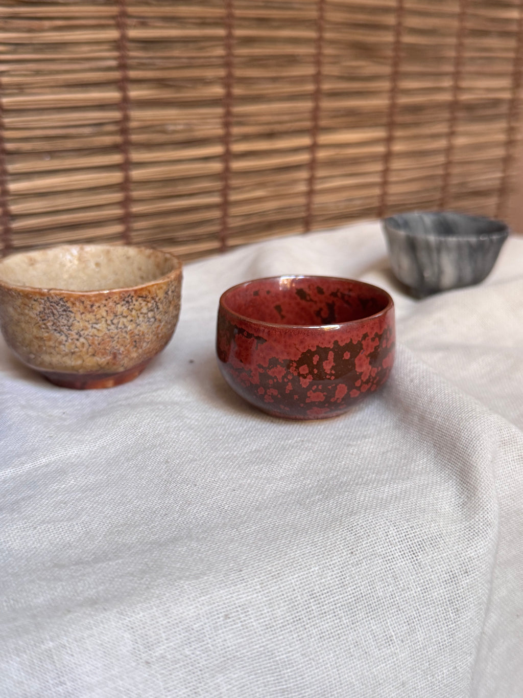 Four Mismatched Guinomi Sake Cups — Cobalt Blue, Crackled Ivory, Marbled Grey, Oxblood Speckle