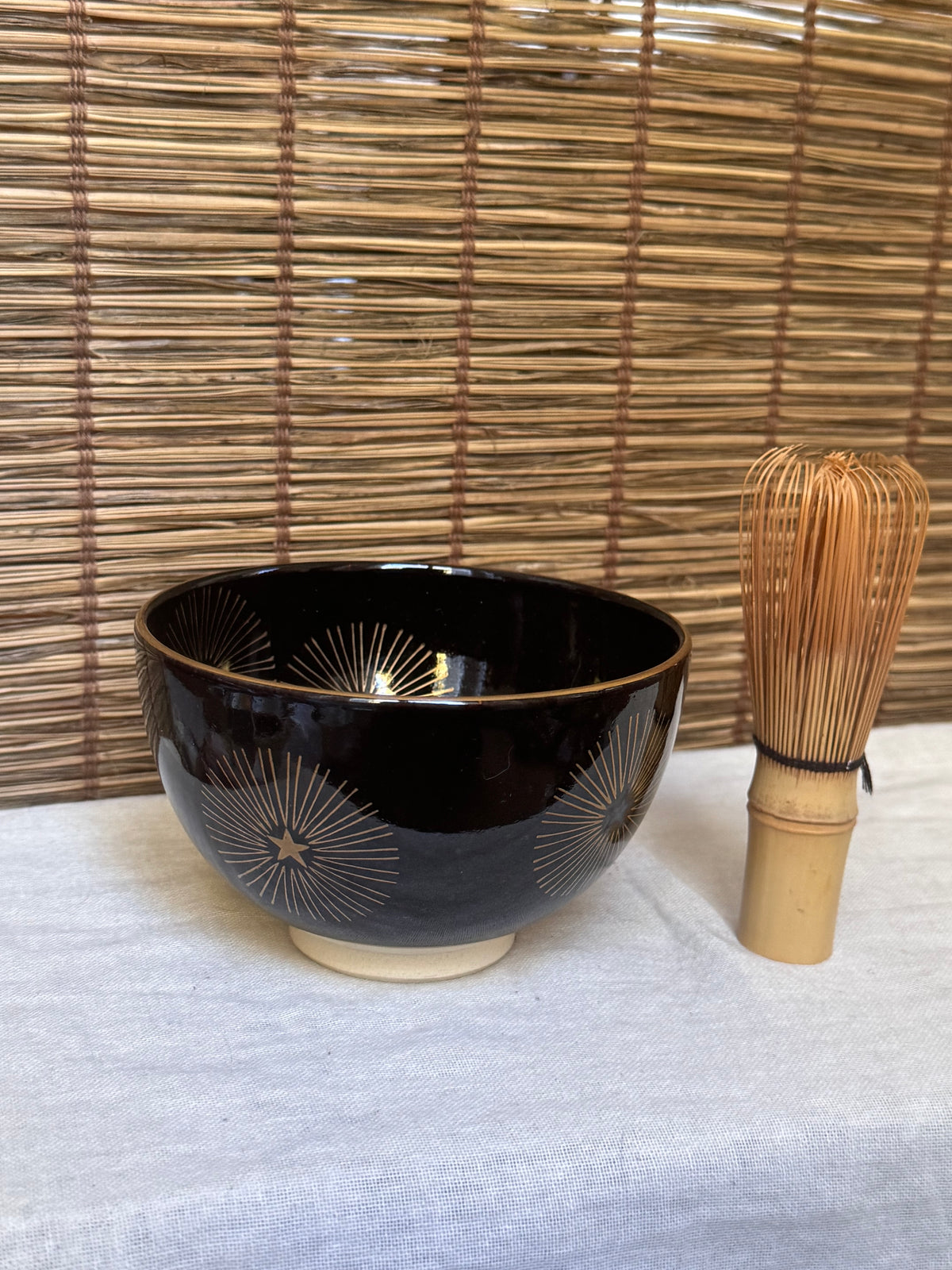 Kyoto Ware Matcha Bowl (Chawan) — Black Glaze, Gold Starburst Motif, Gilded Rim