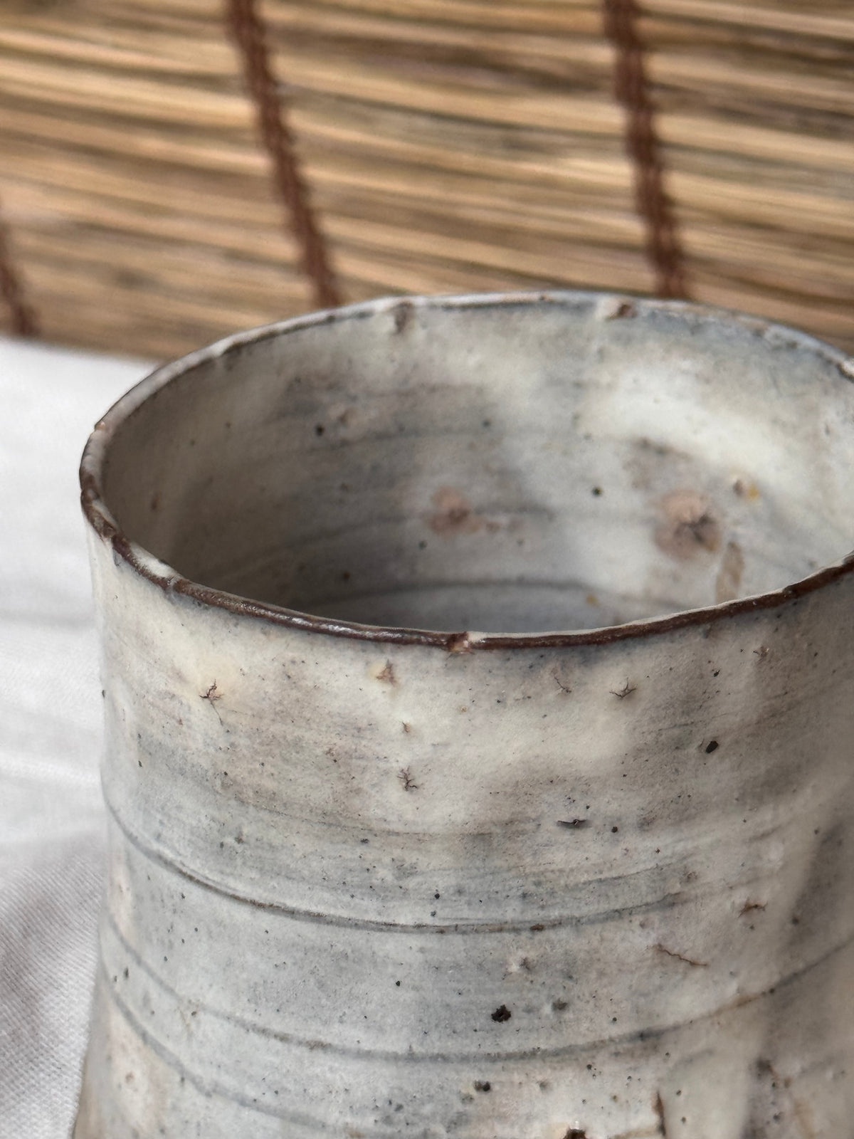 Hagi-Ware Ash-Glazed Stoneware Cup — Tapered Form, Oval Cross-Section, Smoky Fire Markings