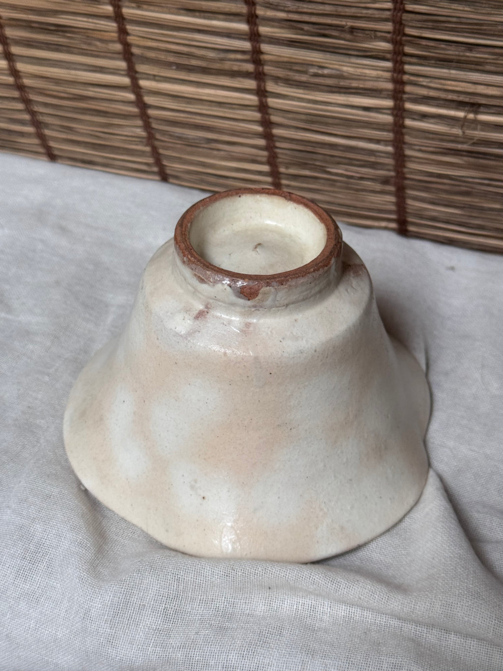 Hagi Ware Trumpet Cup — Wave-Rim Form, Ivory Glaze with Iron Blush